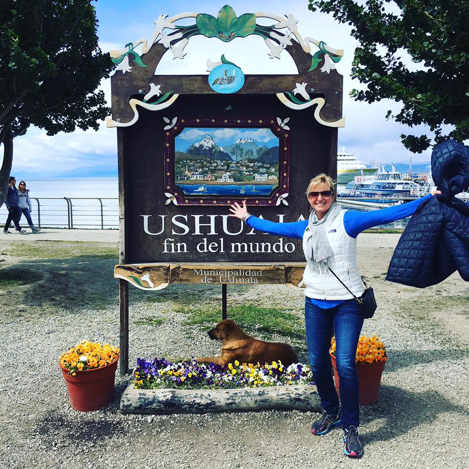 Carolyn in El Fin du Mundo Ushuaia Argentina El Fin del Mundo sign Ushuaia