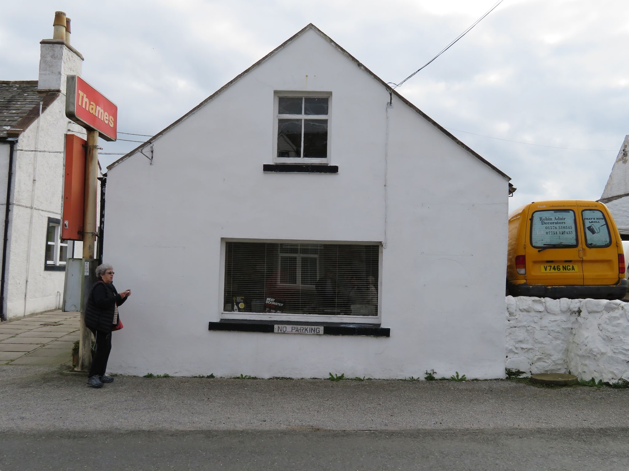An old small white building in Scotland