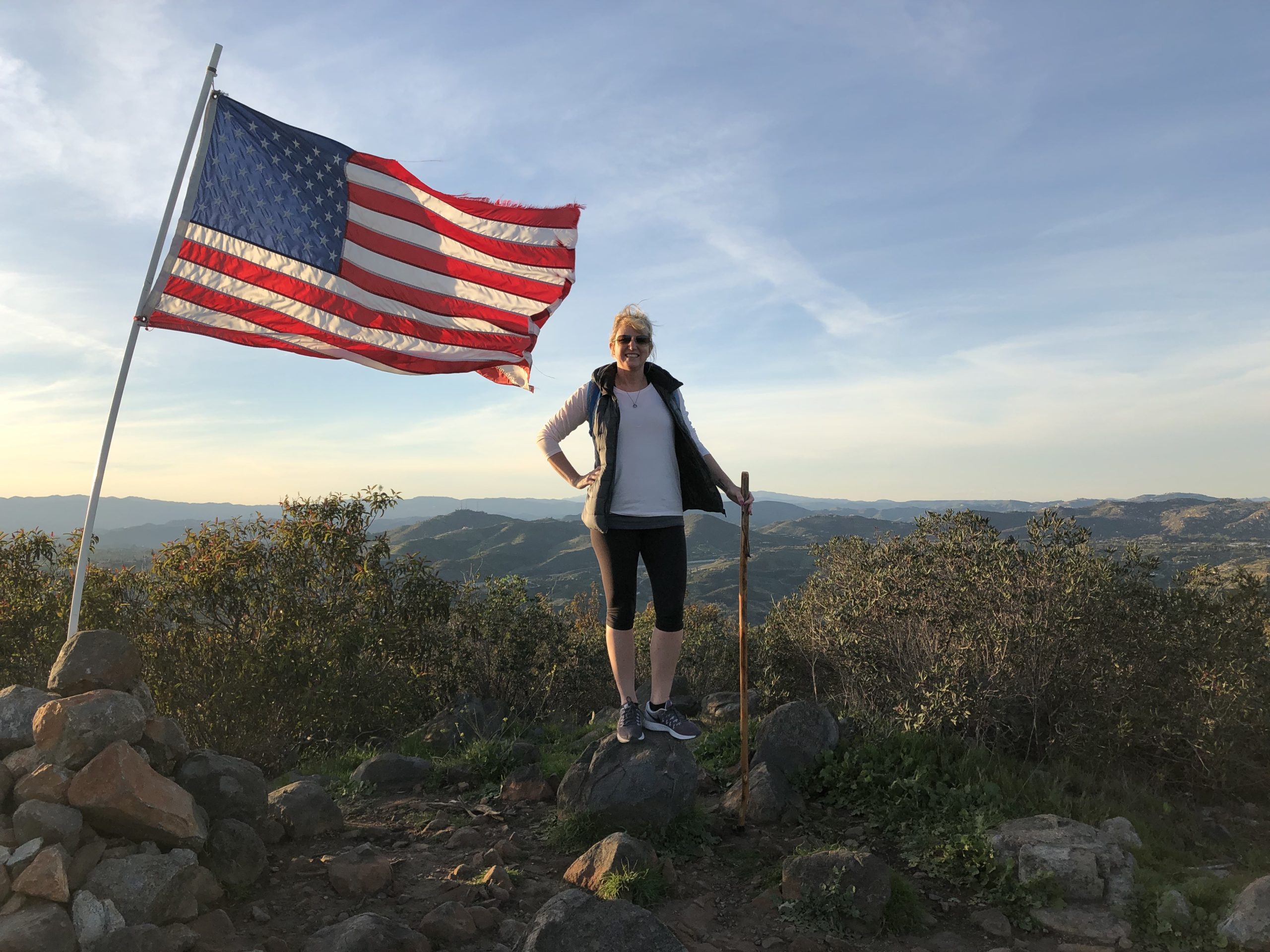 woman mountain american flag