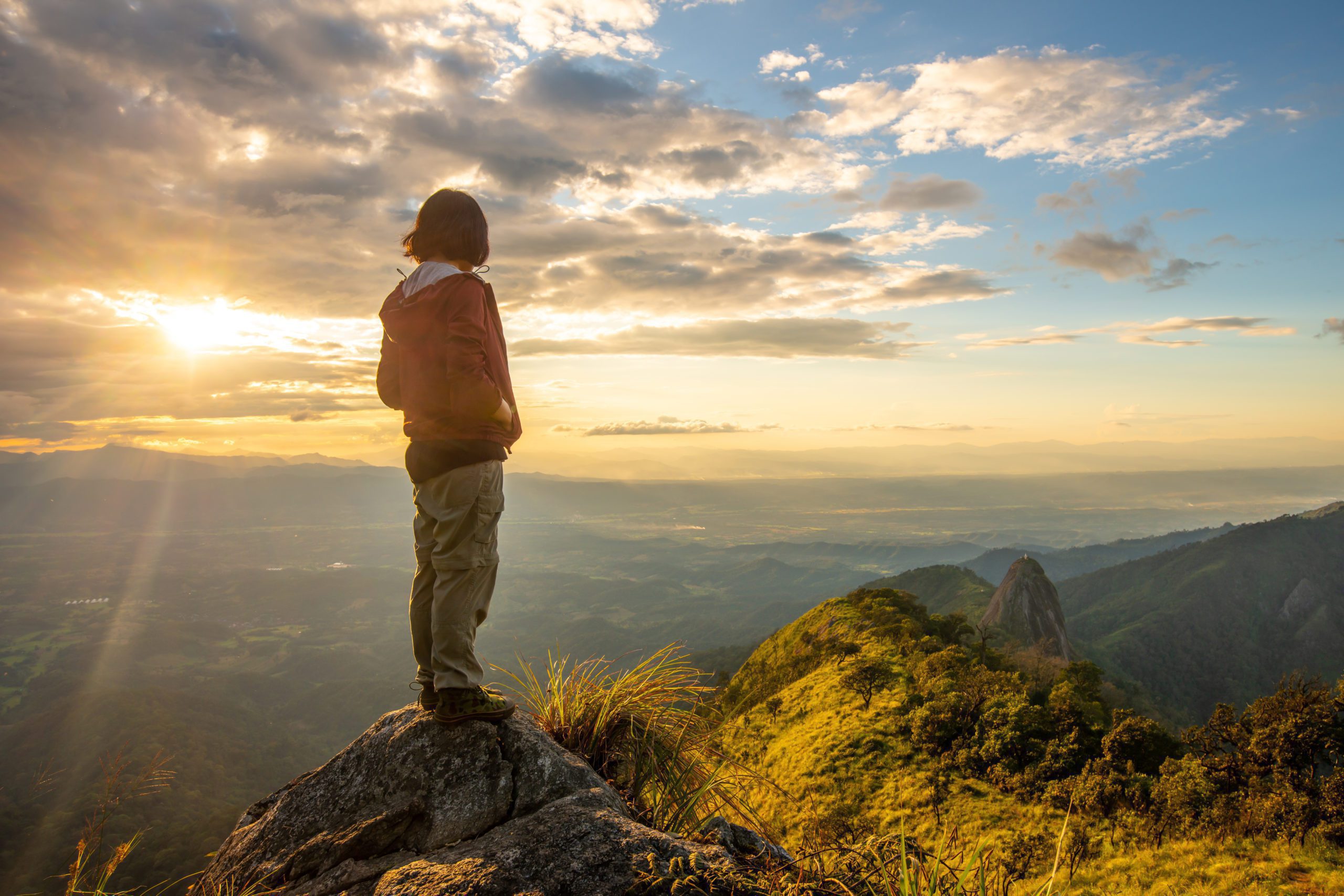 women looking on top of mountain
