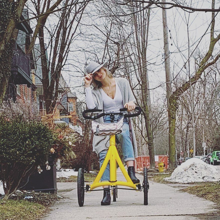 Photo of a women using an alinker for the accessible travel page