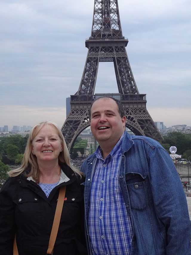 JW contributor Sandy and friend Steve in front of the Eiffel Tower