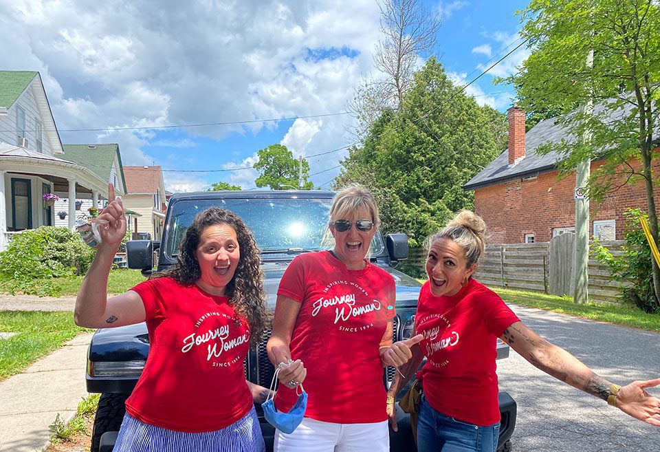 Carolyn, Melissa, and Amanda are road-trip ready in JourneyWoman red