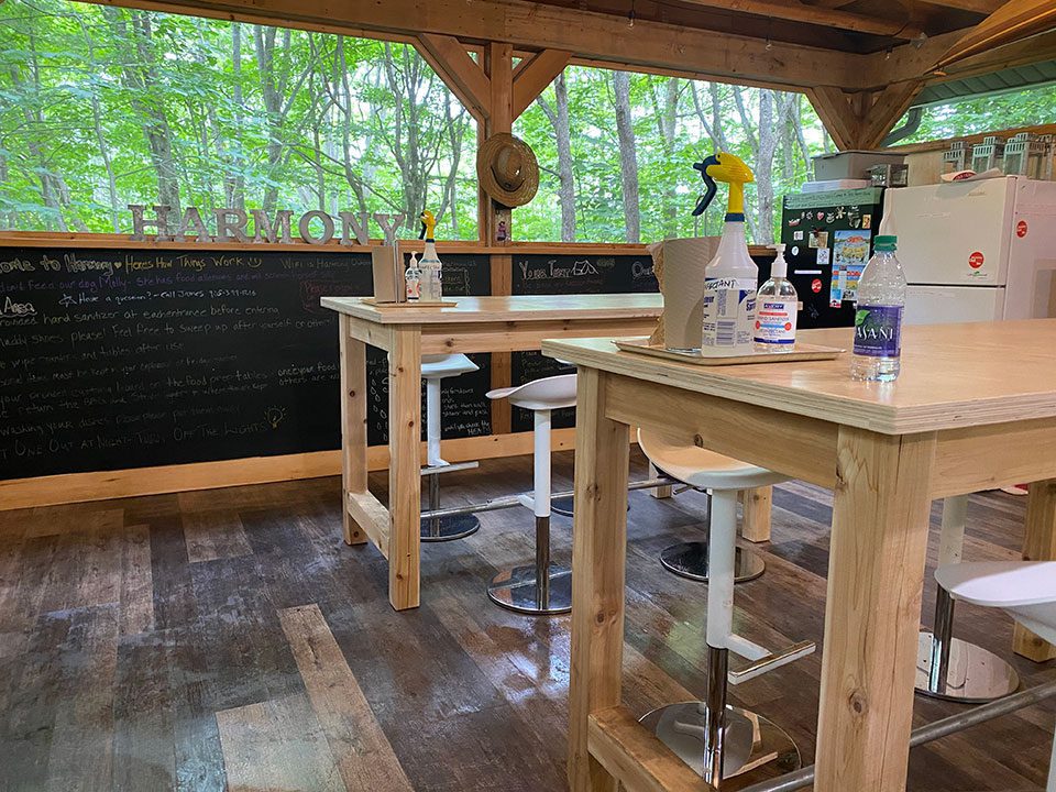 Inside the physically-distanced pavillion on campsite