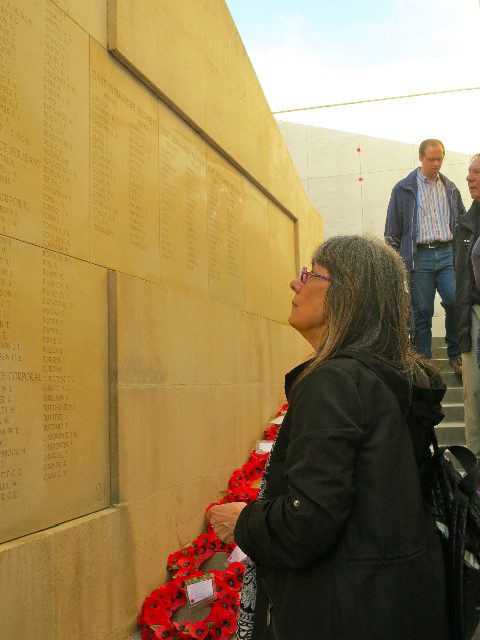 Evelyn Hannon stands to pay her last respects to the fallen