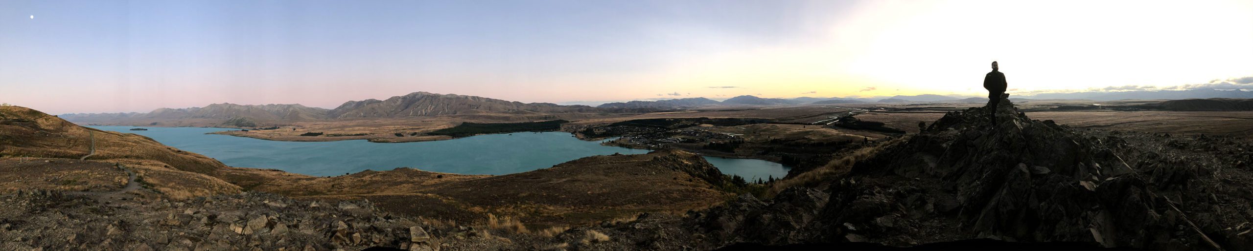 Panoramic shot from the summit of Mount John overlooking Lake Tepako in New Zealand