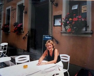 Marillee Carroll sitting at a white table