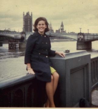 Teri Foster sitting in. front of London Bridge