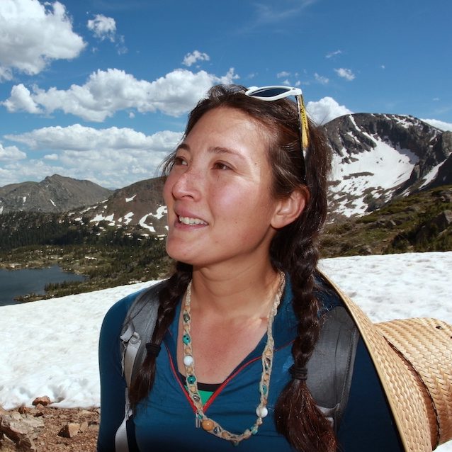 Liz Thomas, professional hiker, out on a snowy trail