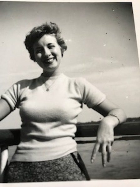 A young Joy Fox smiling, one of our featured women travellers over 65