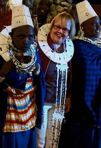 Dee with Maasai women in Tanzania, August 2019, one of our featured women travellers over 65