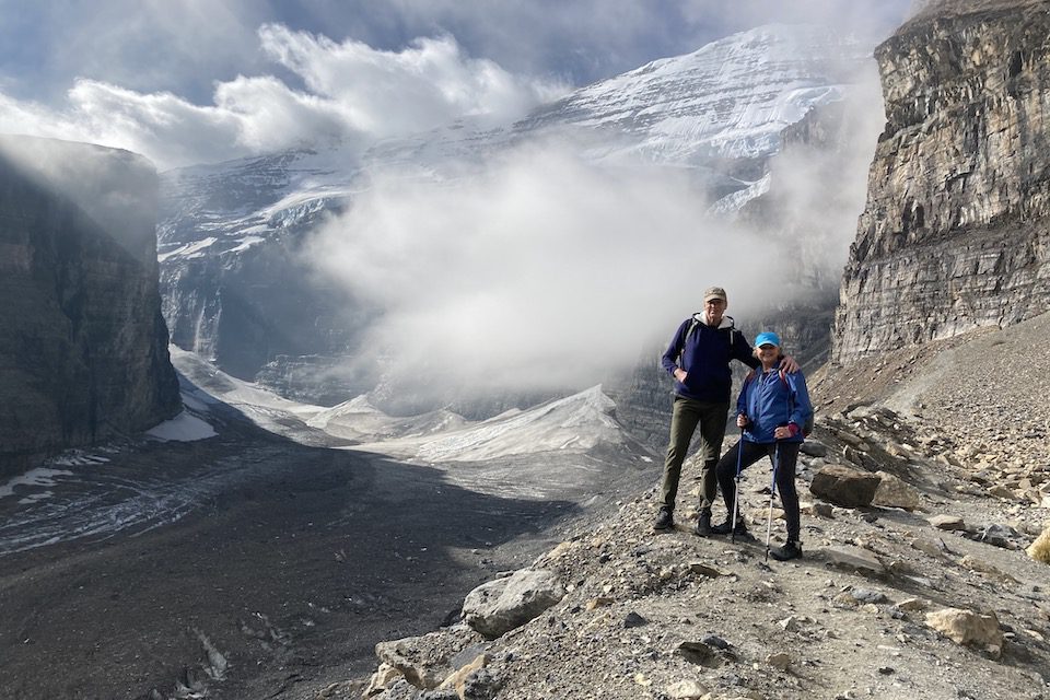 Linda Barnard and Hans Pellikaan at the Abbot Pass lookout, with Mt. Victoria in the background.