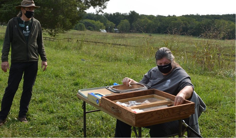 Wendy working at Montpelier, with Matt Reeves, Director of Archaeology, overseeing