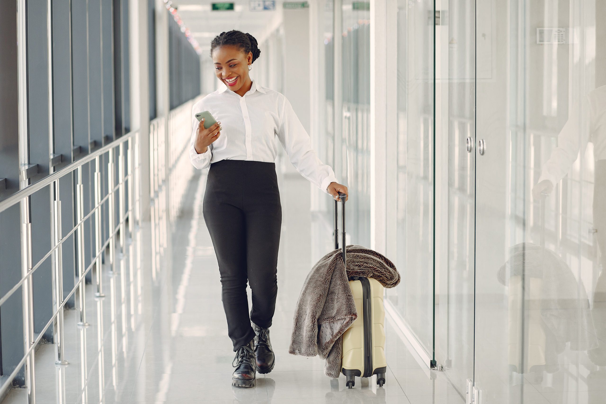 woman walking through airport