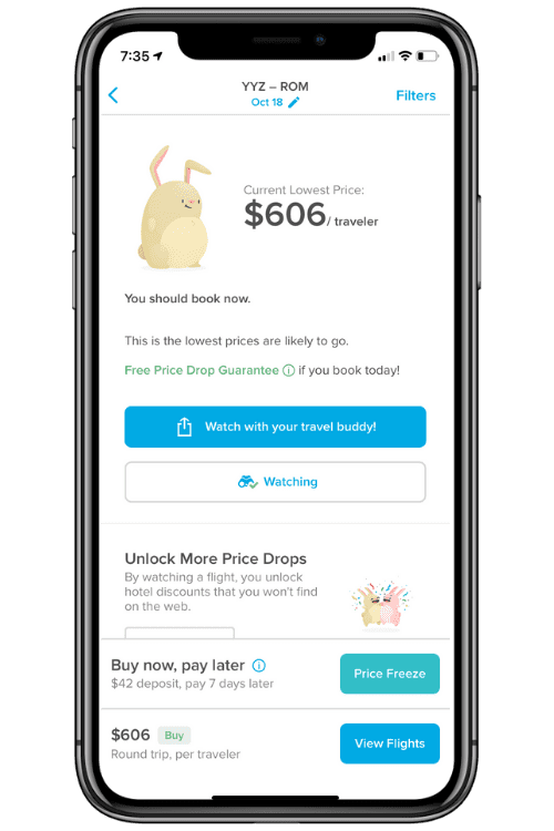 A cell phone showing the Hopper flight finder app