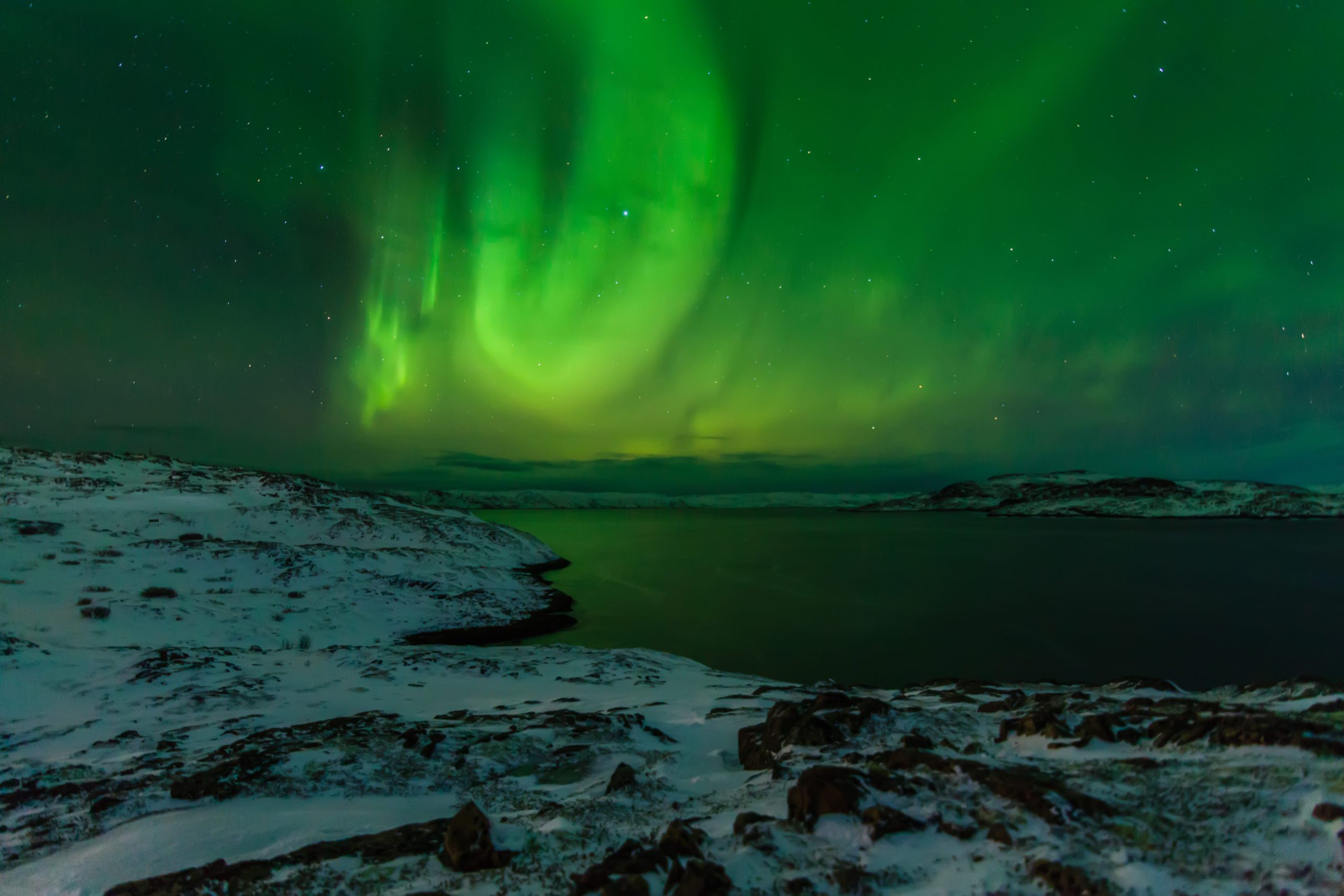 Northern Lights on the shore of the Arctic Ocean