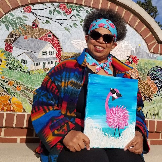 An assortment of travel essentials like disinfectant wipes, toiletry bottles, and floss.