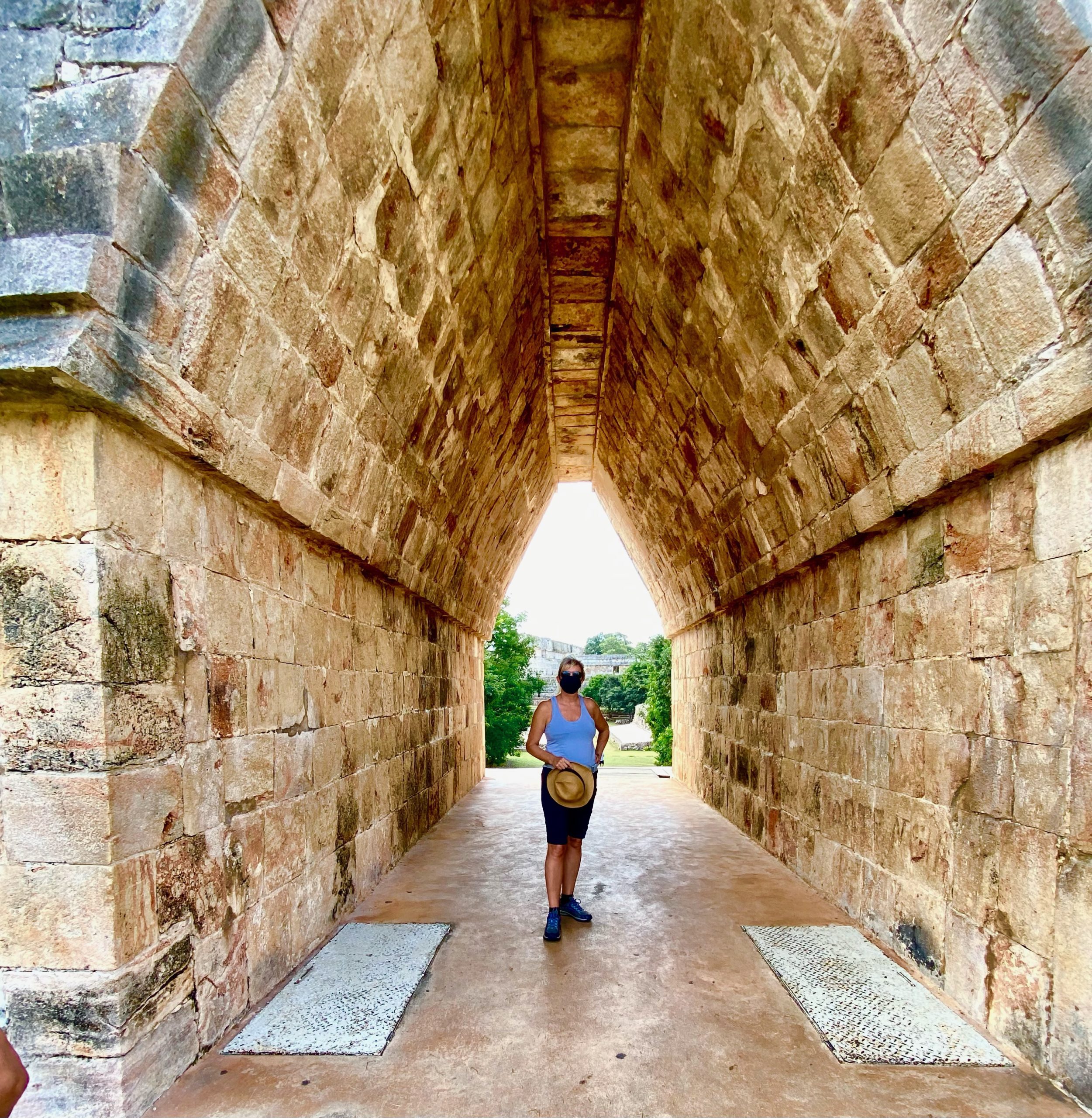 woman standing alone at Uxmal while living in Mexico