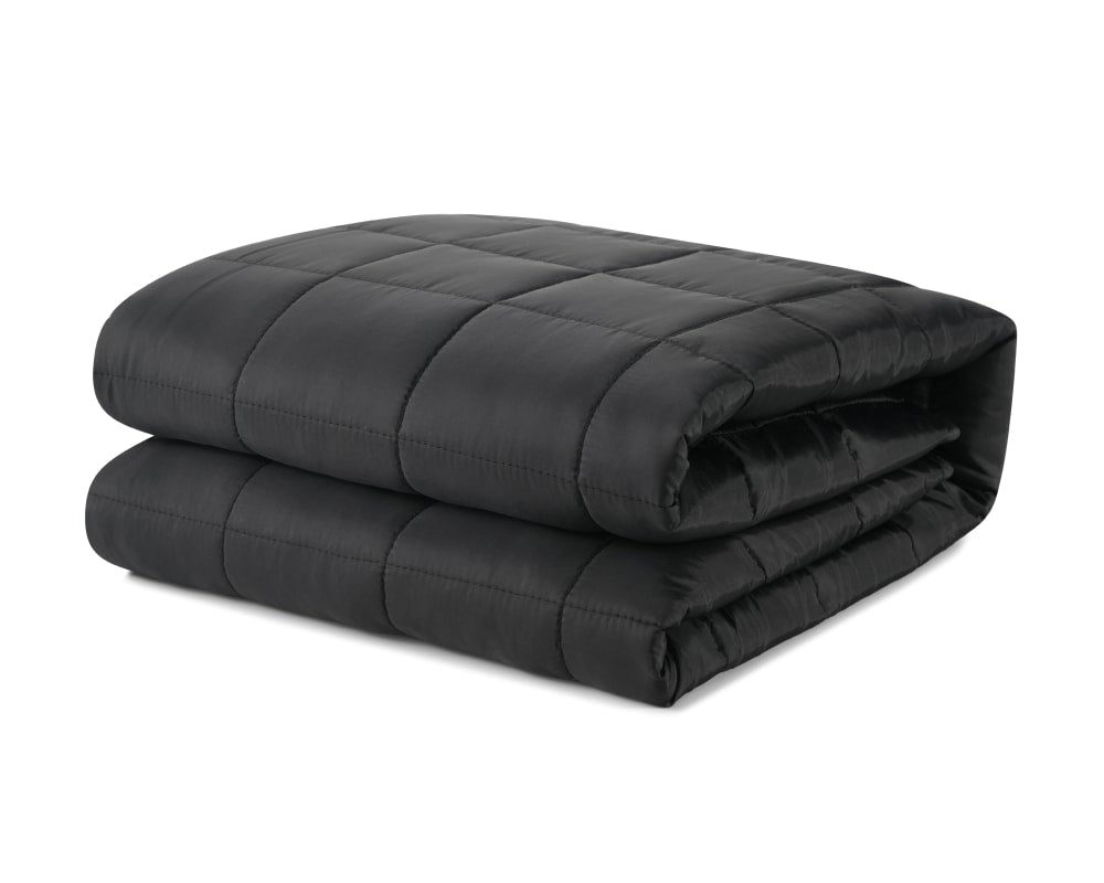 Black travel blanket folded up