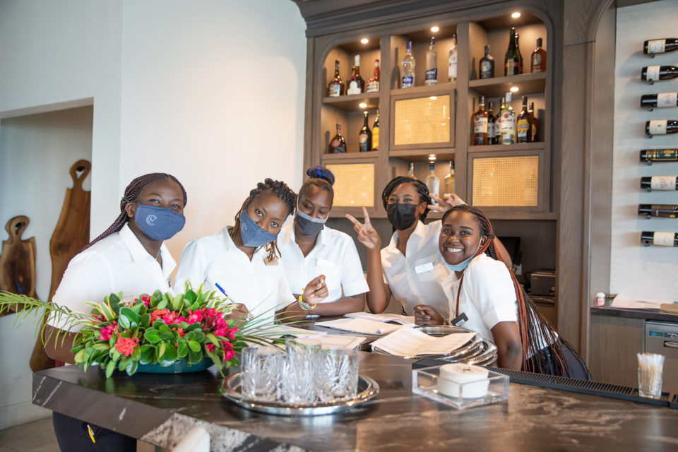Group of five women working at Caerula Mar resort in Bahamas
