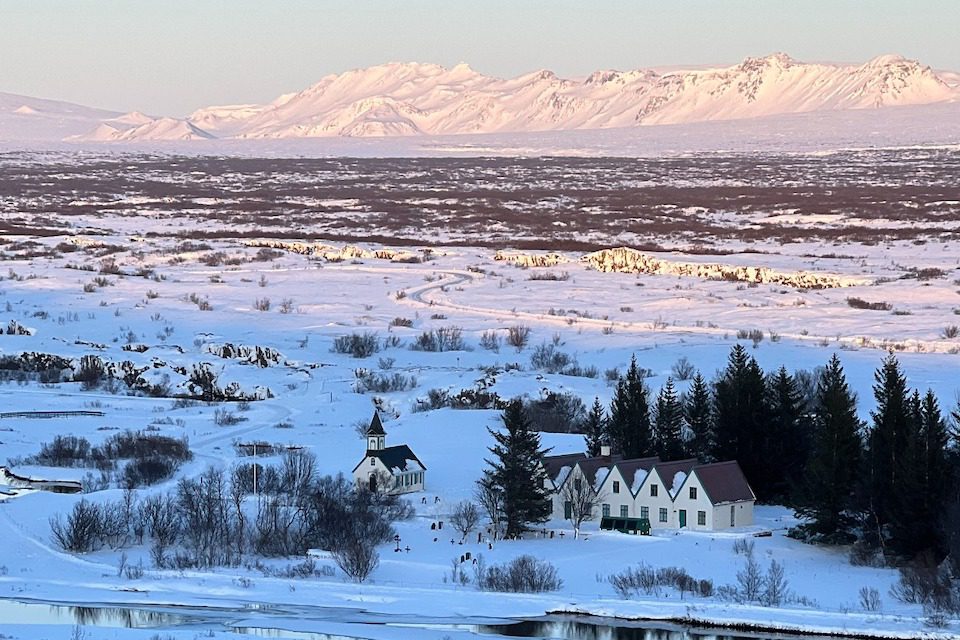 Sunset over snowy mountains in Iceland