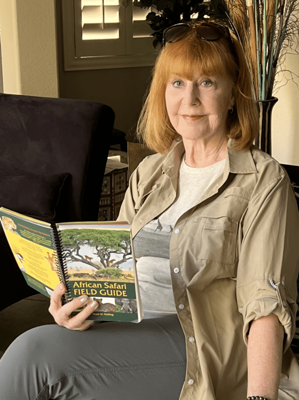 woman in chair reading book