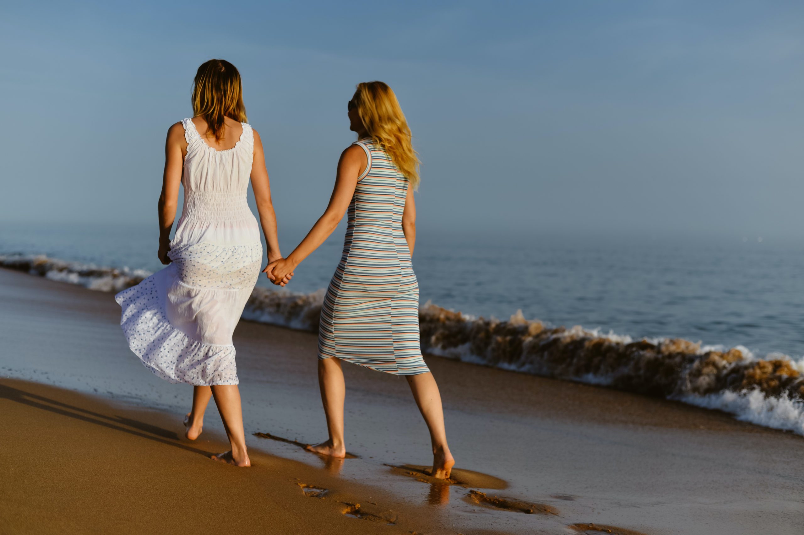 Back view of two woman on holiday travel vacation