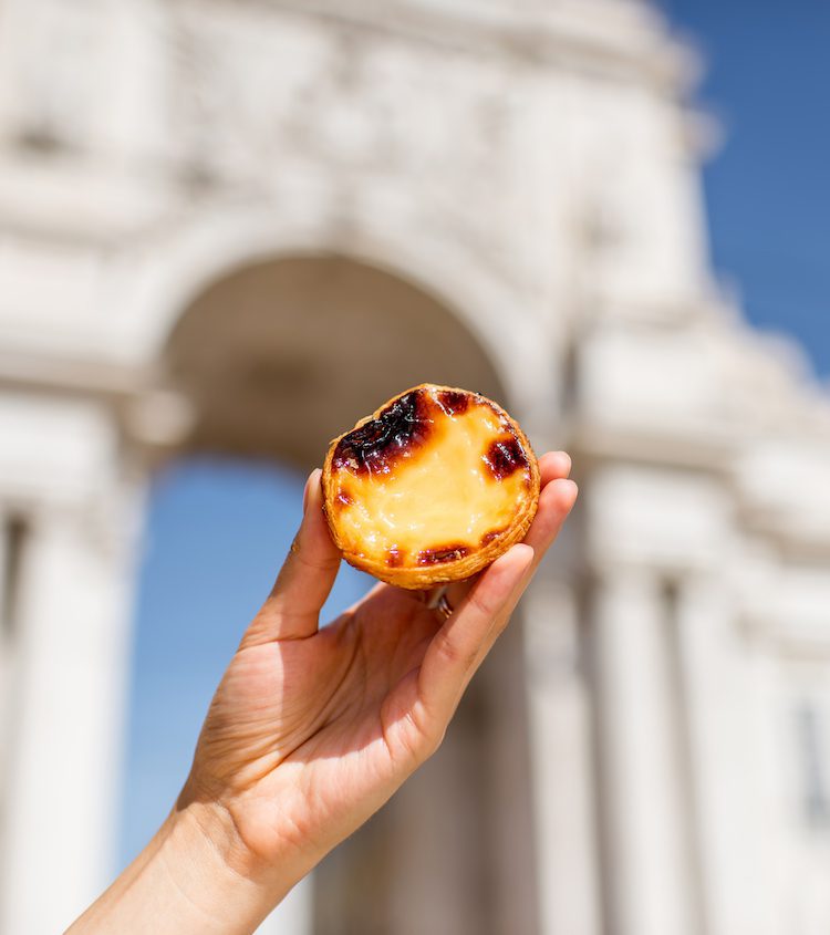 Holding pastel de Nata in Lisbon
