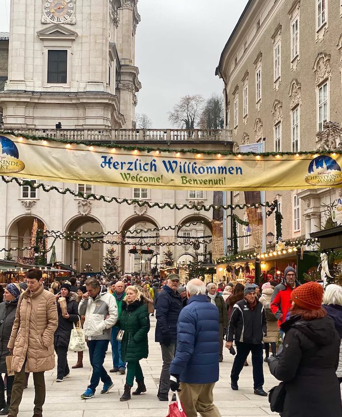 People walk along the Salzburg Christmas Market