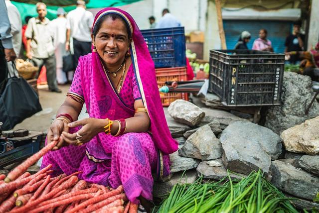 Indian woman wearing a pink Sari at a local market