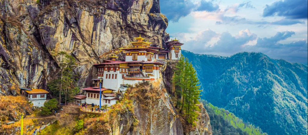 photo of a temple on cliffside