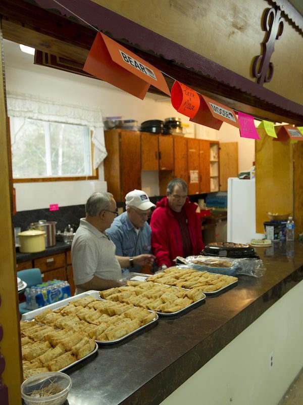 Community suppers involve armies of volunteers who produce the food, serve it, and clean up afterwards!