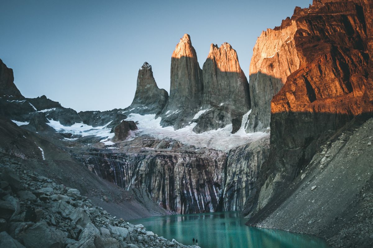 Glacial lake in front of big rocks in chile