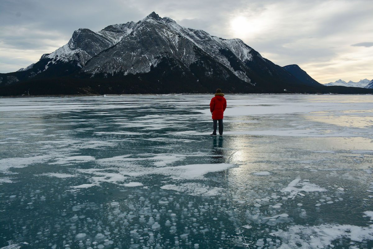 Abraham Lake Ice Bubbles - The ice bubbles in Abraham Lake have become an Instagram phenomenon. They are caused when organic material at the bottom of the lake is broken down by microbes to produce methane gas that freezes in the ice.