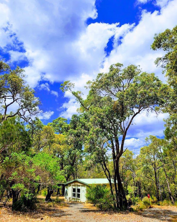 A tiny cabin in the backcountry of Perth, Australia. One of the 30 less-traveled places for women in 2024 to explore.