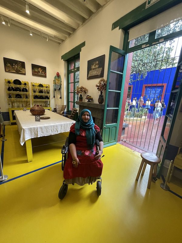 Tanzila Kahn at the Frida Kahlo Museum (Casa Azul/The Blue House) , one of five accessible places in Mexico City she visited.