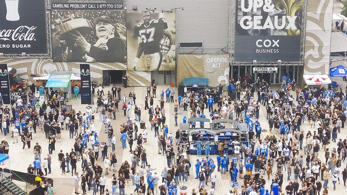 Fans assemble in front of the Superdome before a Saints game in New Orleans.