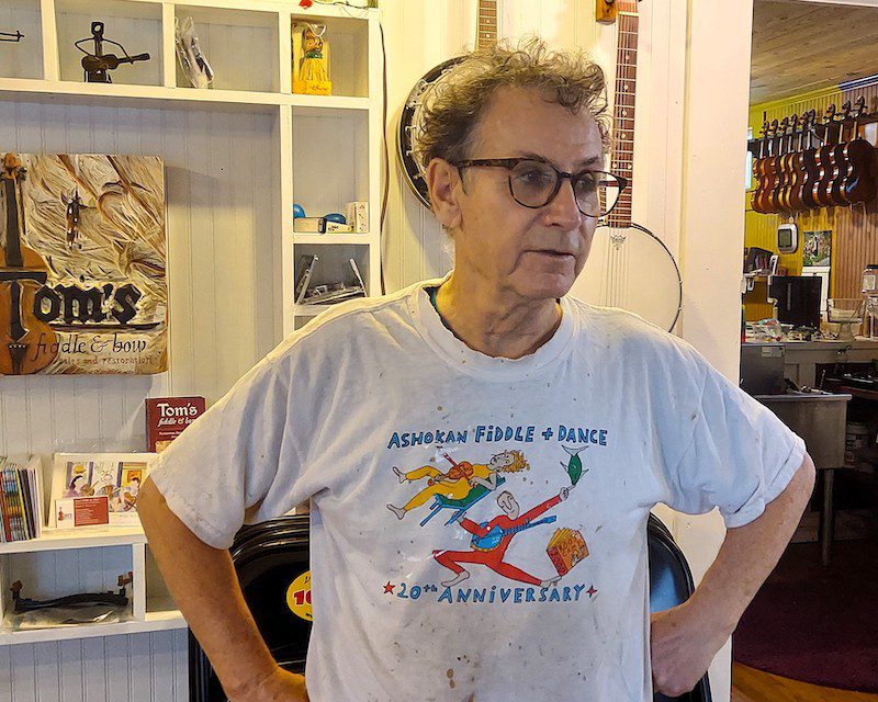 Tom, of Tom's Fiddle and Bow repair shop in Arnaudville Louisiana