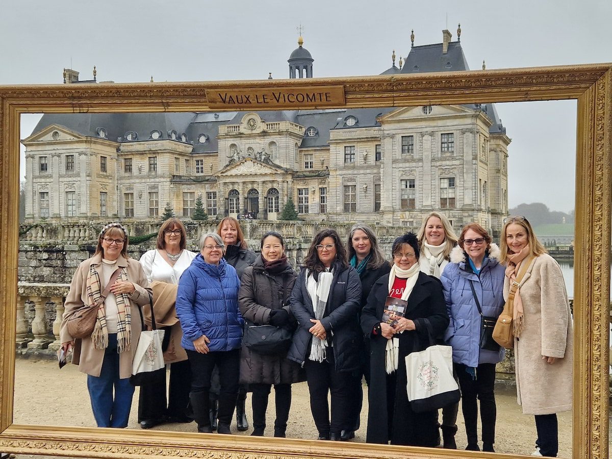 A group at a chateau in France with best-selling chef Steena Holmes.