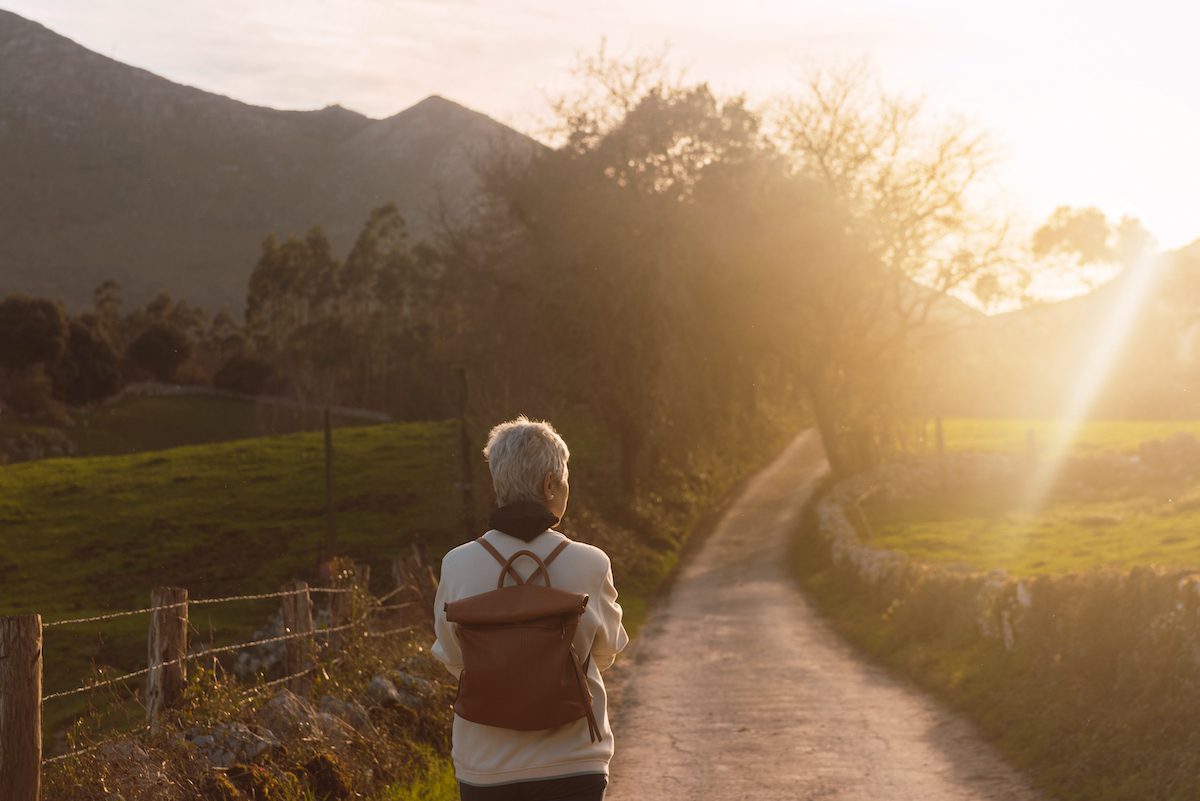elderly woman doing activities in nature. pensioner enjoying a day out.