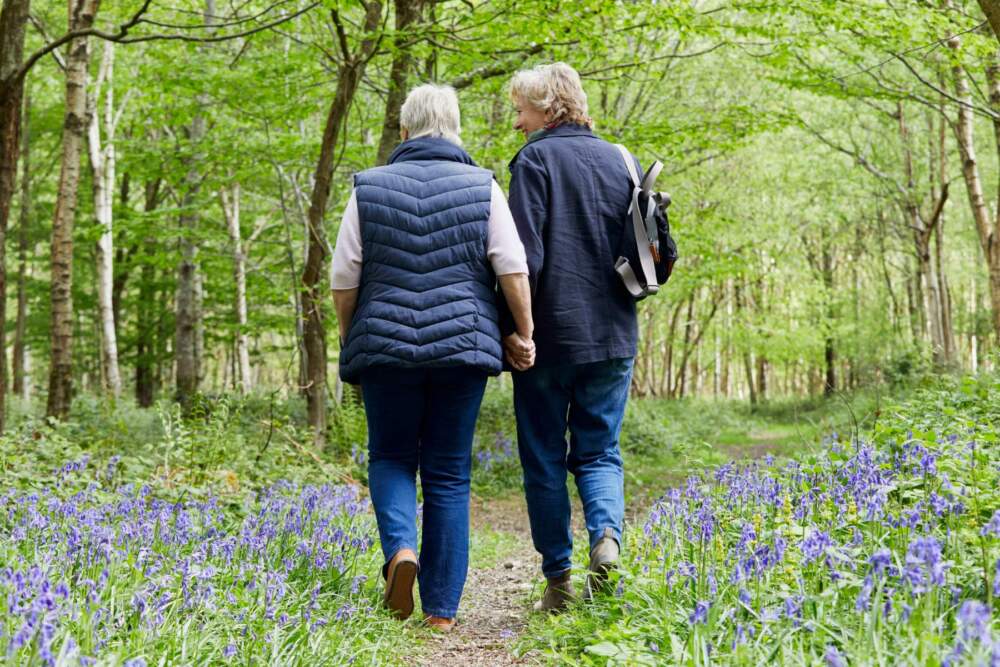 woman cleaning basement decluttering 
