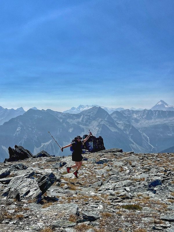 A woman hiking a mountain in British Columbia, Canda