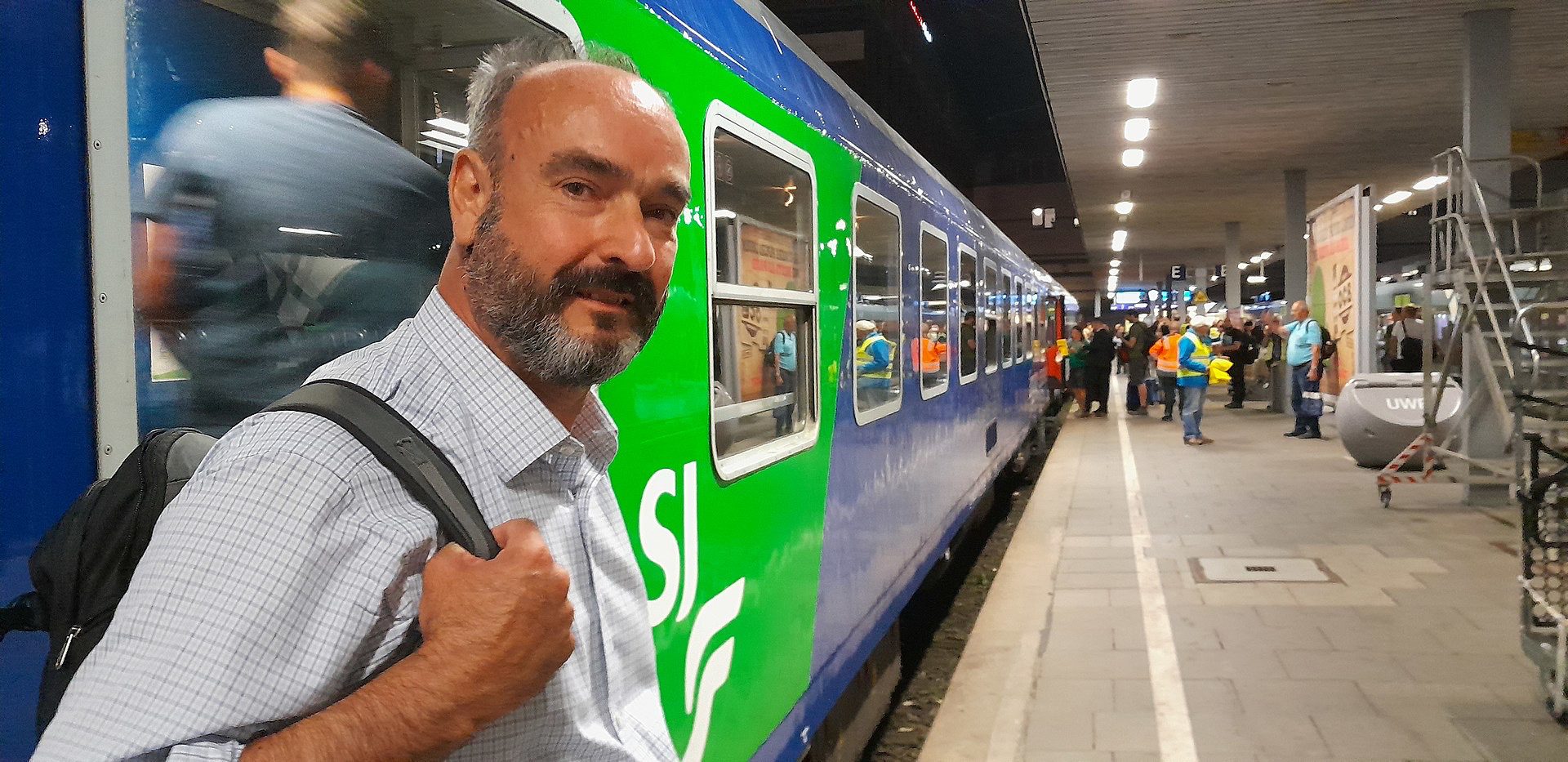 man next to train seat 16 mark smith train travel