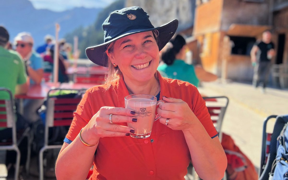 Claudia drinking Ovaltine at Aescher Hut 