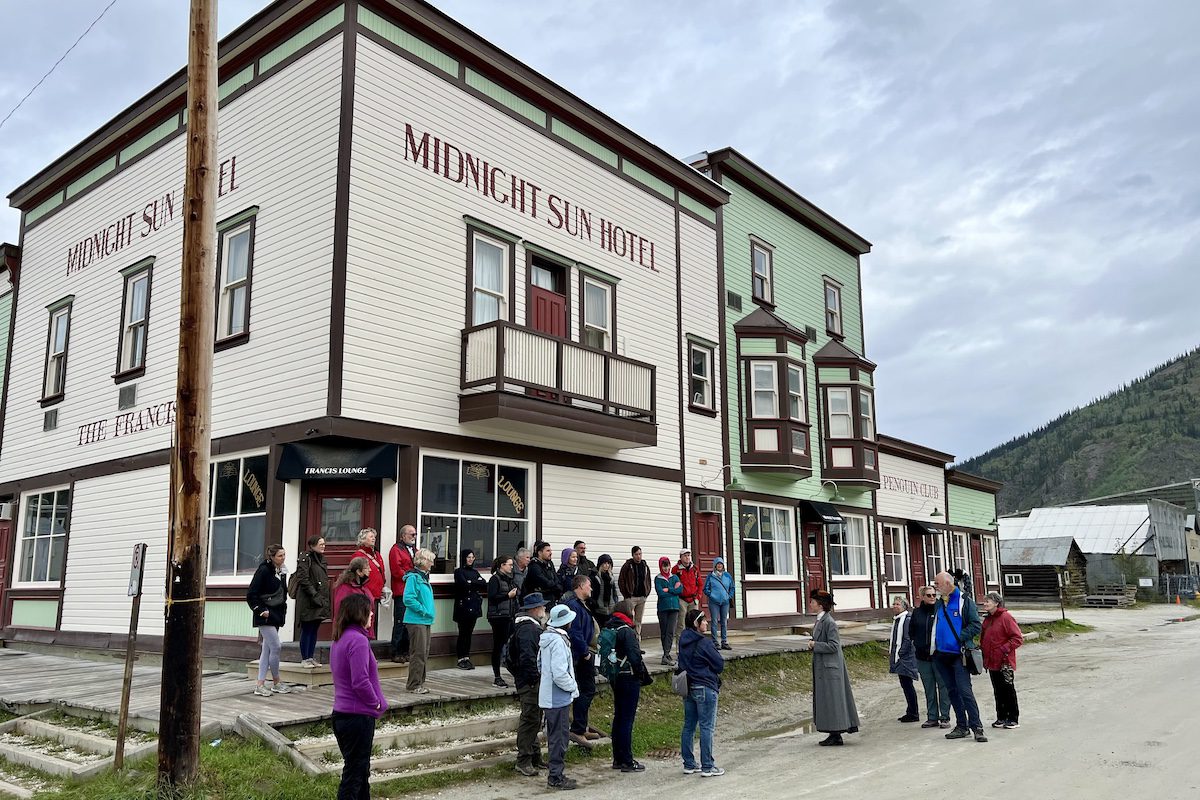 Parks Canada leads a tour through Dawson City