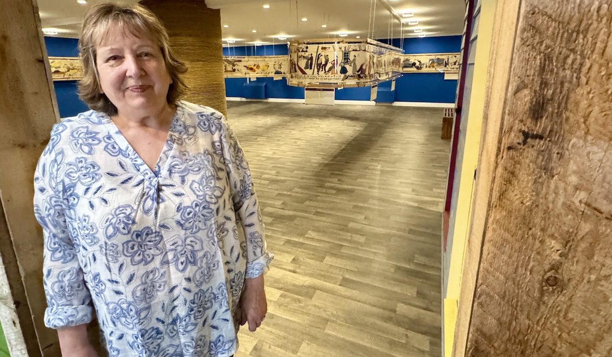 Joan Simmonds shows off the French Shore Tapestry