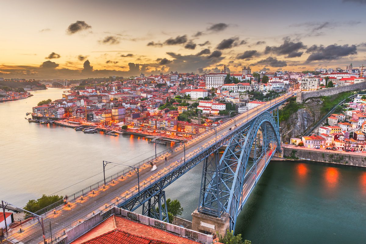 Porto, Portugal Skyline over Dom Luis I Bridge and Douro River.