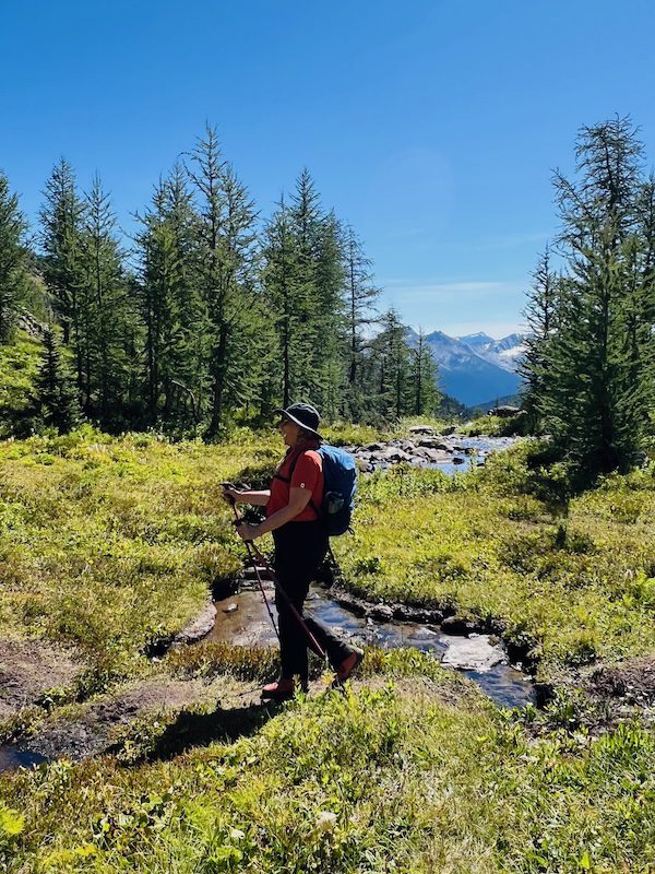 Claudia Laroye writer in her happy hiking place
