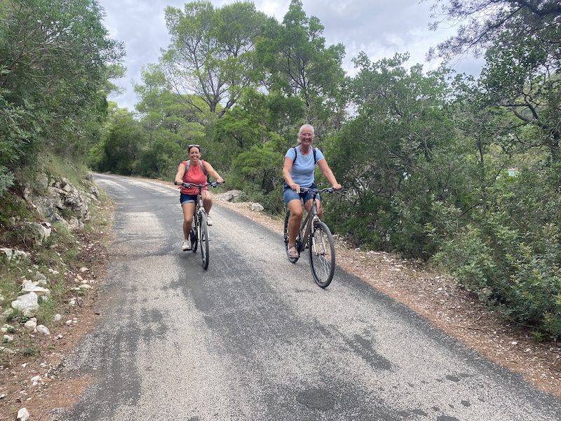 Two women cycling Mljet Croatia