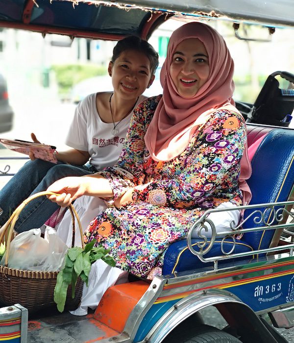 Taking a tuk-tuk ride in Bangkok